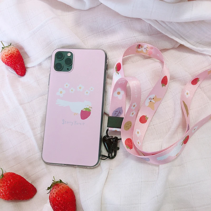 ŽVAIGŽDĖTAS MIŠKO Žemuogių mielas mobiliųjų telefonų dirželiai ant kaklo ir rankos riešo mergina rožinė diržu, telefoną ir fotoaparatą